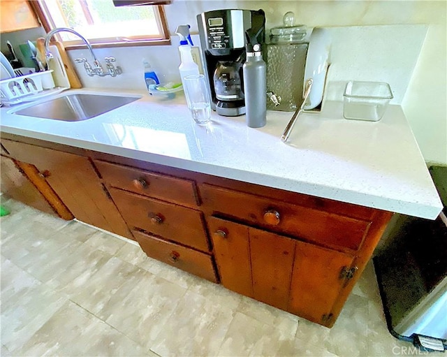 1201 W Verdugo Ave, Burbank, CA 91506 - kitchen with light countertops, brown cabinets, and a sink