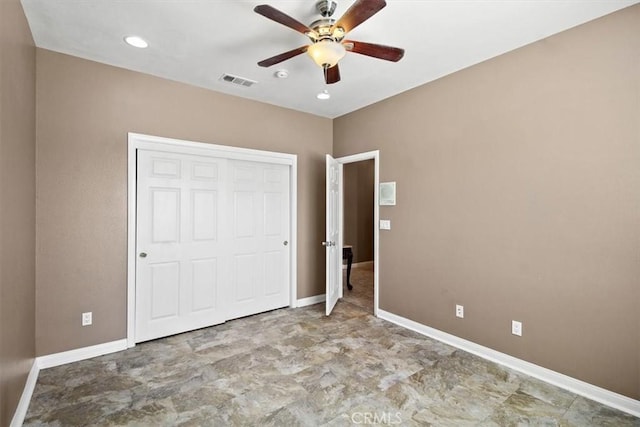 unfurnished bedroom with a closet and ceiling fan