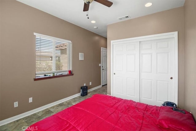 bedroom with a closet and ceiling fan