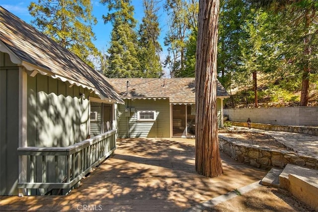 exterior space featuring a wooden deck