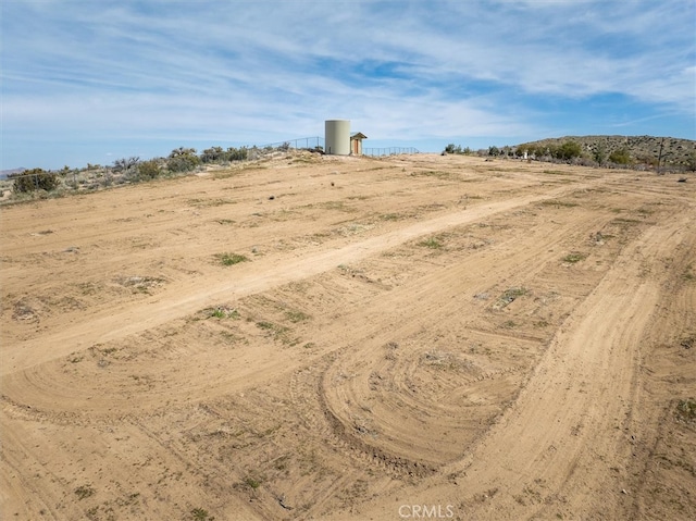 exterior space with a rural view