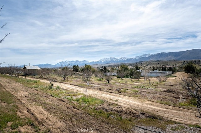 view of mountain feature with a rural view