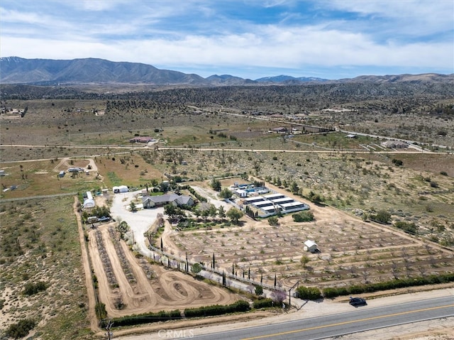 aerial view featuring a mountain view and a rural view