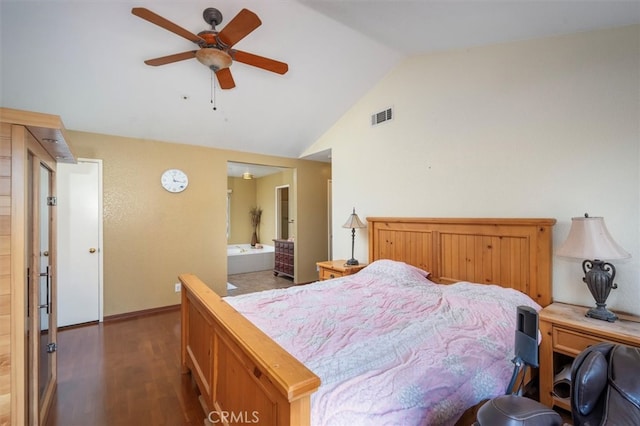 bedroom featuring lofted ceiling, ensuite bath, ceiling fan, and dark hardwood / wood-style flooring