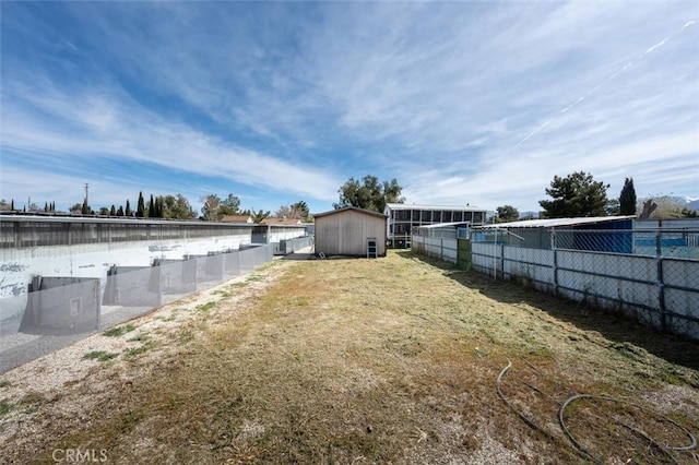 view of yard with a storage shed