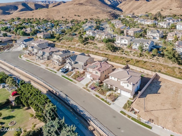 drone / aerial view featuring a mountain view