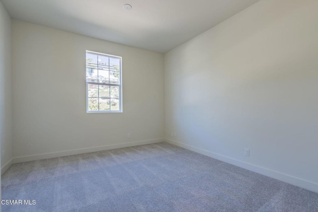 spare room with carpet flooring