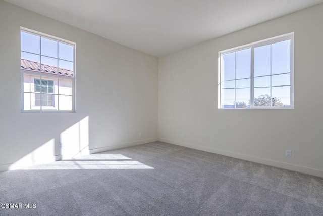 view of carpeted spare room