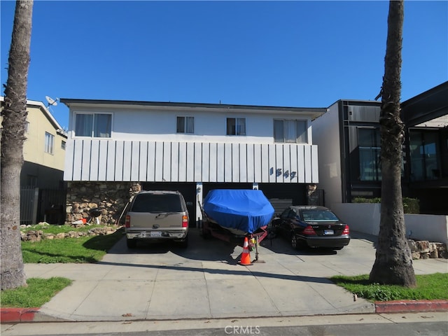 view of front of home with a balcony