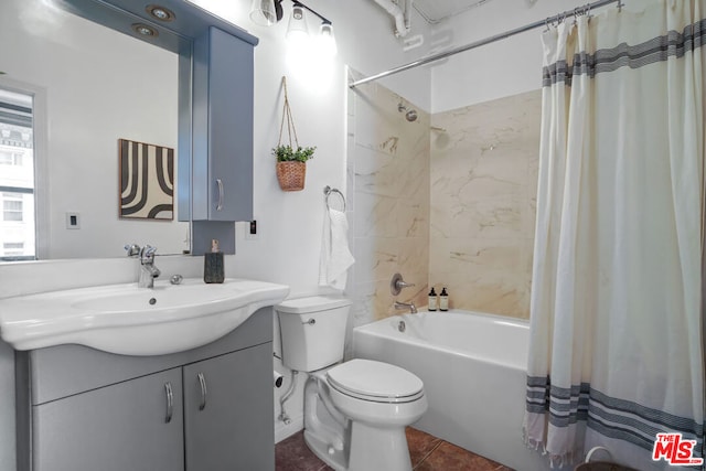 full bathroom with shower / bathtub combination with curtain, tile patterned flooring, vanity, and toilet