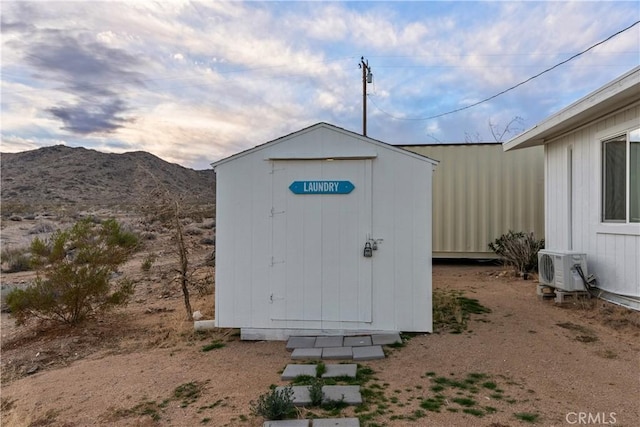 view of outdoor structure featuring a mountain view