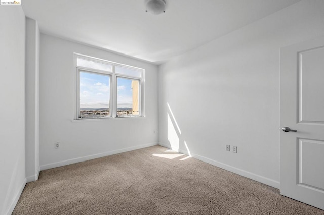 empty room featuring carpet