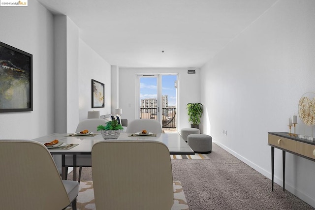 dining room featuring carpet floors