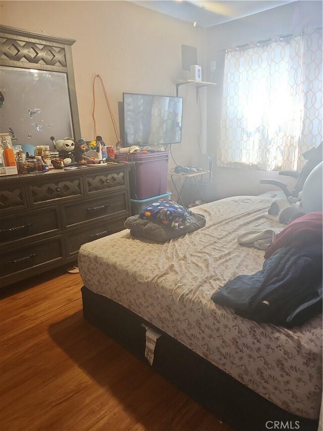 bedroom featuring light wood-type flooring