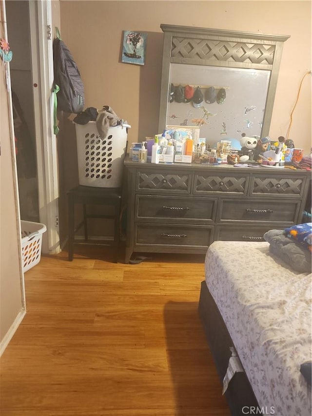 bedroom featuring light hardwood / wood-style floors