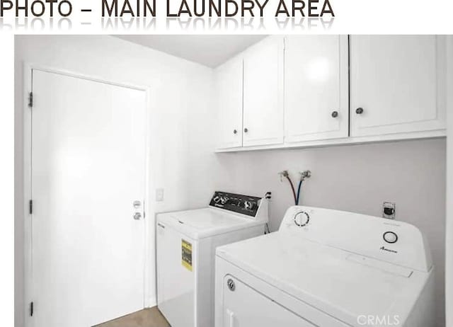 laundry room featuring cabinet space and independent washer and dryer