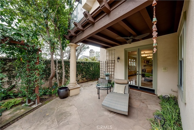 view of patio / terrace with french doors and ceiling fan