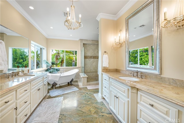 bathroom with vanity, crown molding, a notable chandelier, and separate shower and tub