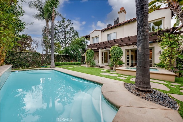 view of swimming pool featuring a patio area, an in ground hot tub, and a pergola