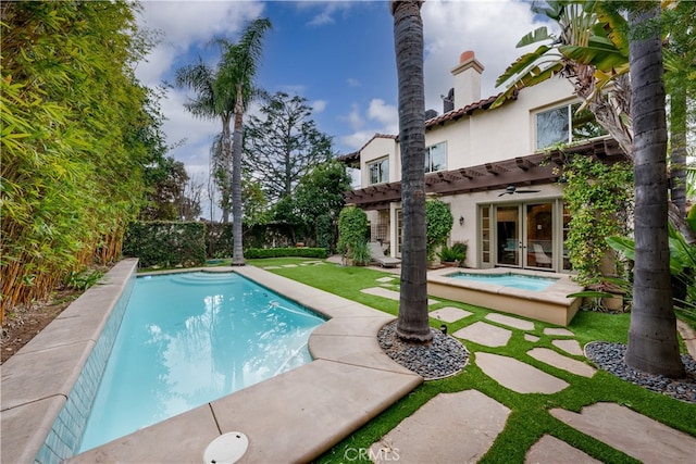 view of pool with a yard and a patio area