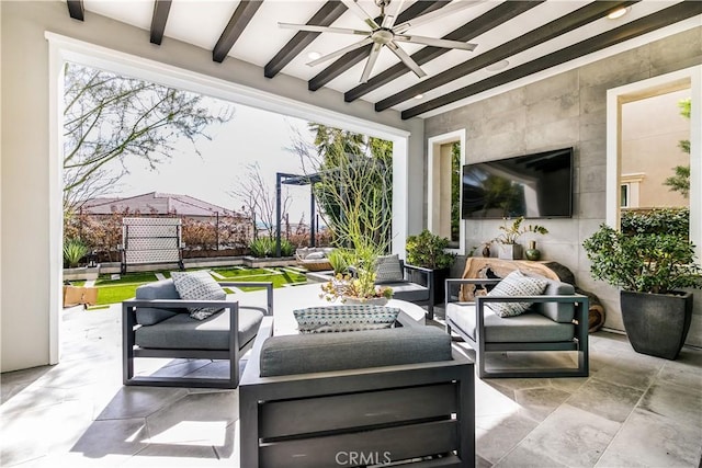 view of patio / terrace with an outdoor living space and ceiling fan