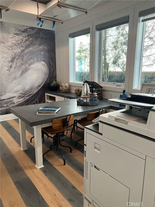 home office featuring hardwood / wood-style flooring