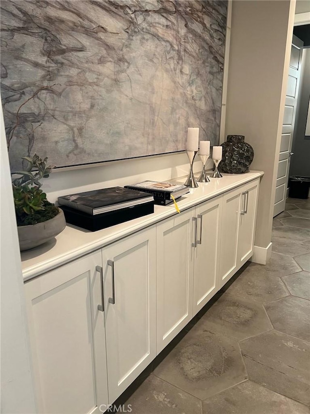 kitchen featuring white cabinets