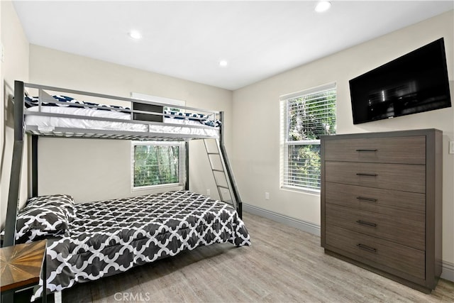 bedroom featuring light hardwood / wood-style floors