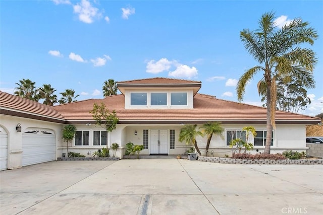 view of front of home with a garage