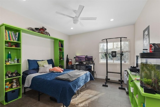 bedroom with ceiling fan and light tile patterned floors