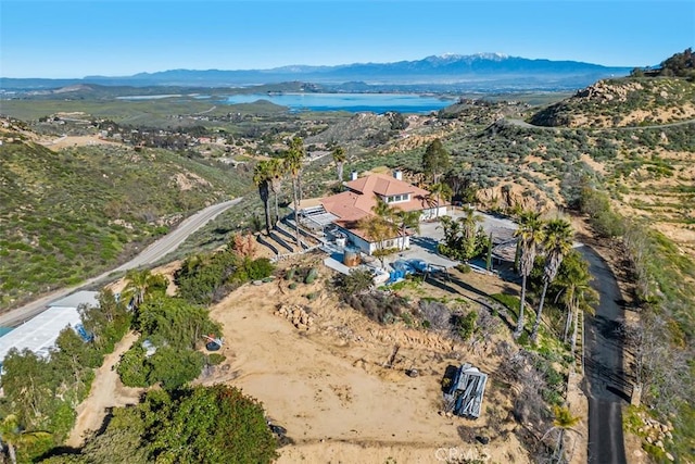 aerial view with a water and mountain view