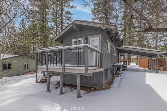 view of snow covered property