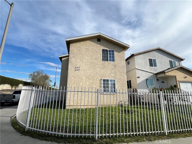 view of property exterior with a yard