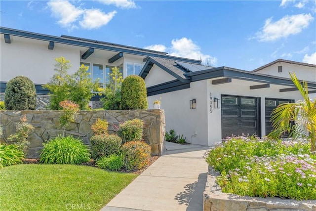 contemporary house featuring a garage