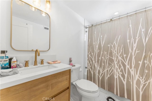 full bathroom featuring vanity, shower / bath combination with curtain, and toilet