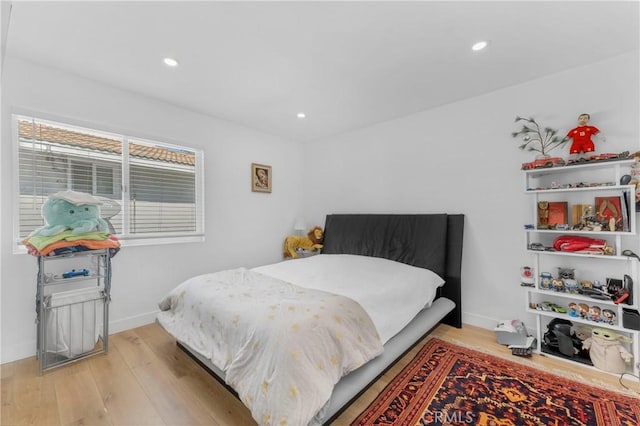 bedroom featuring light wood-type flooring