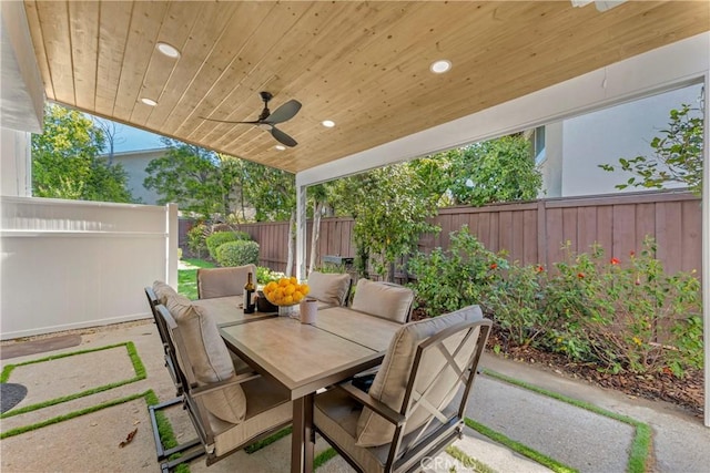 view of patio featuring ceiling fan