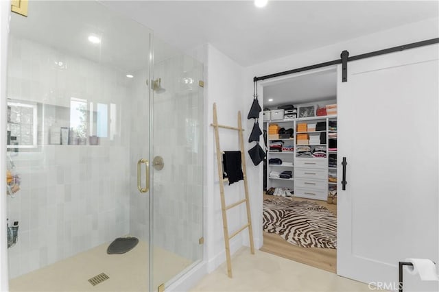 bathroom featuring an enclosed shower