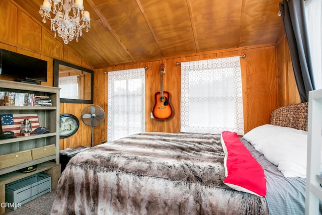 bedroom with wood walls, vaulted ceiling, wooden ceiling, and a chandelier