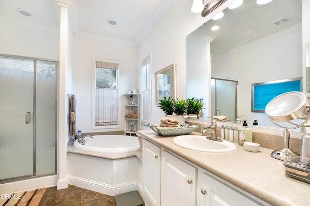 bathroom with independent shower and bath, vanity, and plenty of natural light