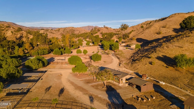 bird's eye view featuring a rural view and a mountain view