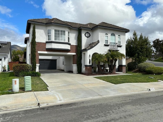 view of front facade featuring a garage and a front yard