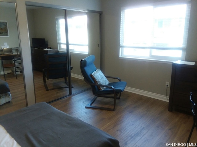 living area featuring hardwood / wood-style floors