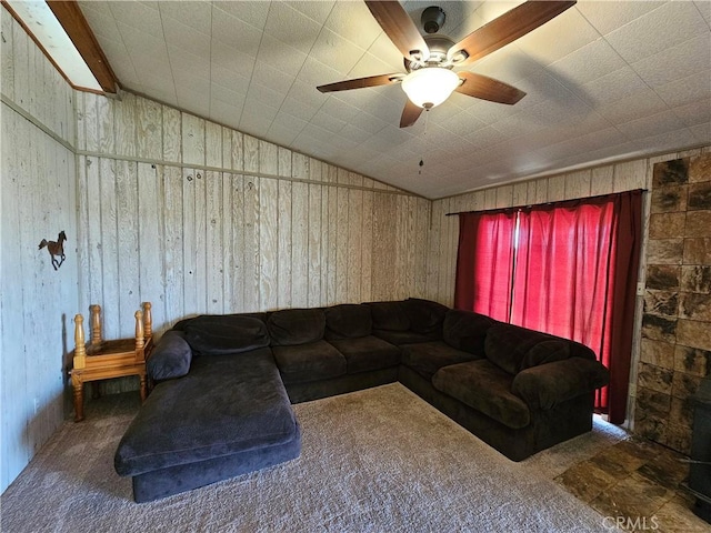 living area with lofted ceiling and ceiling fan