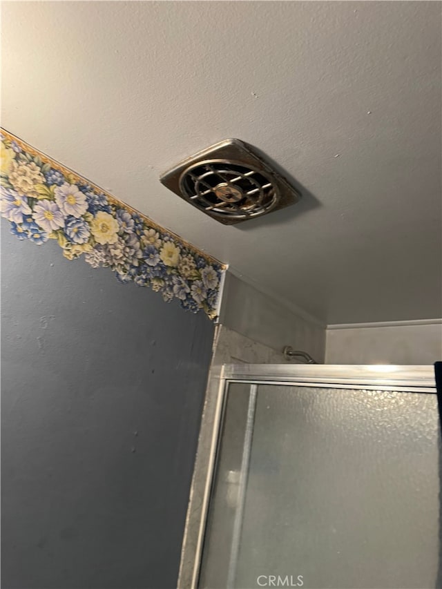 interior details with a shower