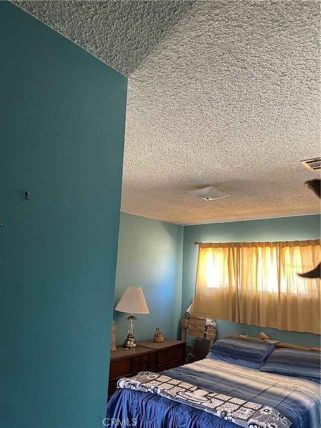 bedroom with a textured ceiling