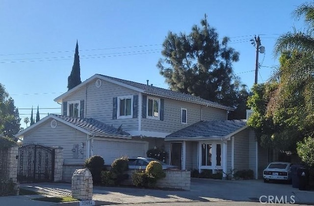 front facade with a garage