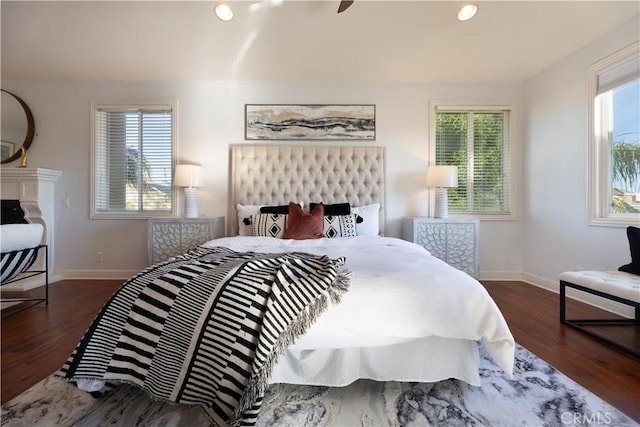 bedroom featuring dark hardwood / wood-style flooring