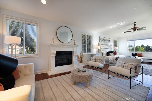 bedroom featuring hardwood / wood-style flooring and ceiling fan