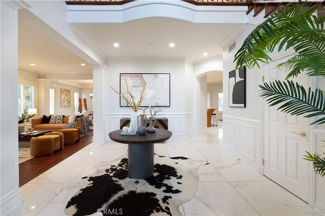 hallway featuring crown molding